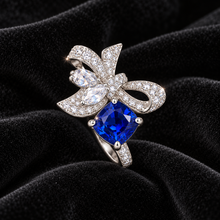 [Correnva V3 velvet main] Cobalt Papillon Ring. AI-assisted presentation image on a dark velvet art direction; not exact-item, material, stone identity, scale, size, or inventory proof.