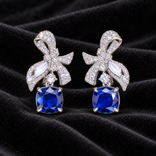 [Correnva V3 velvet main] Cobalt Papillon Drops. AI-assisted presentation image on a dark velvet art direction; not exact-item, material, stone identity, scale, size, or inventory proof.