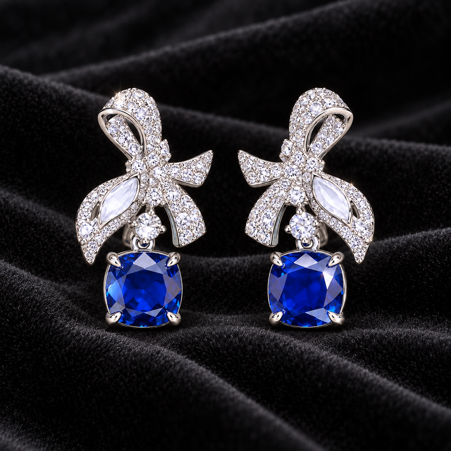 [Correnva V3 velvet main] Cobalt Papillon Drops. AI-assisted presentation image on a dark velvet art direction; not exact-item, material, stone identity, scale, size, or inventory proof.